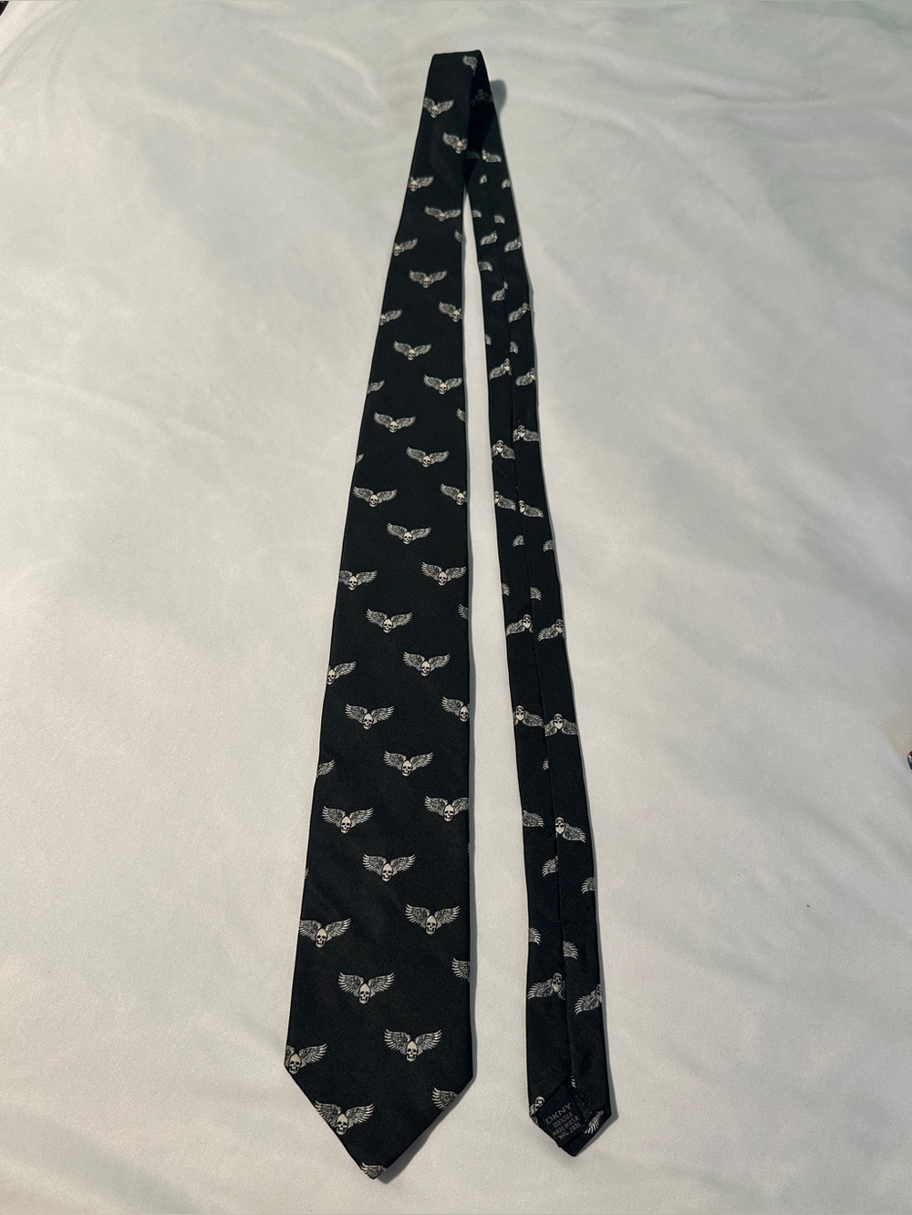 DKNY Black Tie with Silver Wing Motif